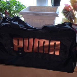 Black and rose gold puma duffle
